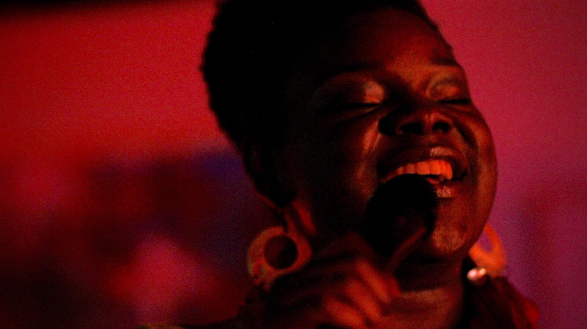 Ebony Ann Blaze sings.